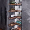 Elegance Series large magic corner pull-out unit showing full extension of multi-layer corner storage in gunmetal gray.