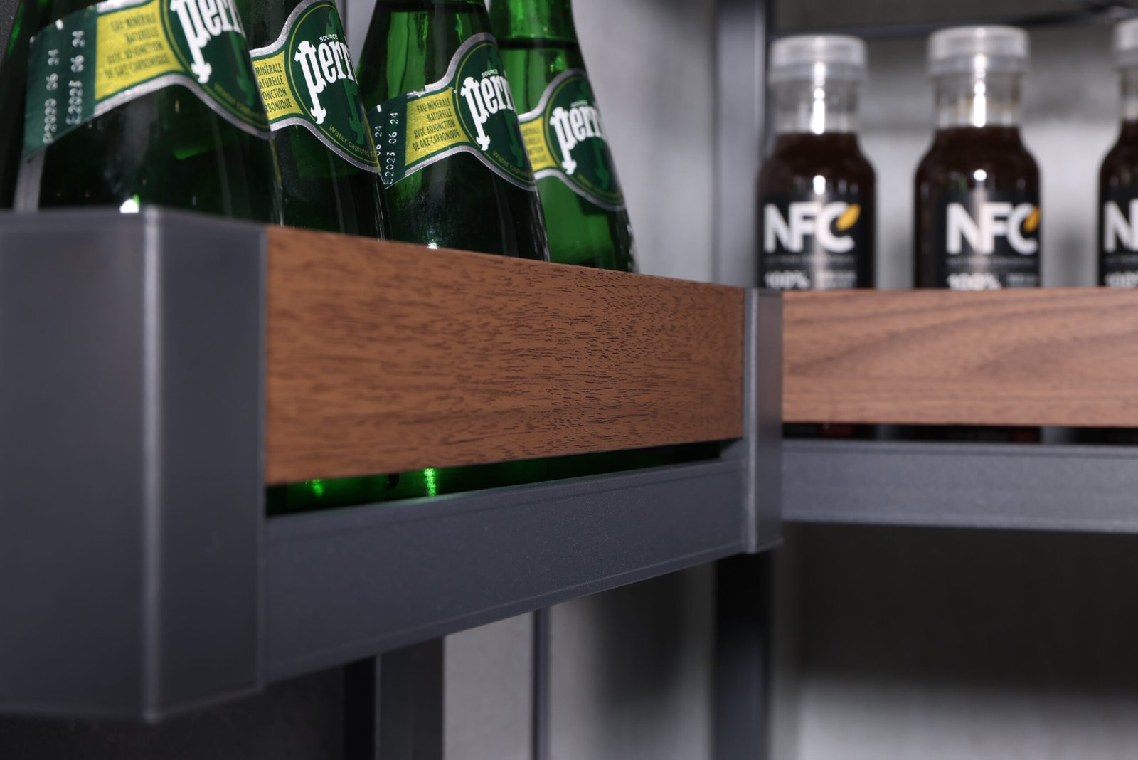 Elegance Series kitchen storage accessories with organized cabinet space and modern pull-out storage solutions for convenient kitchen organization.
